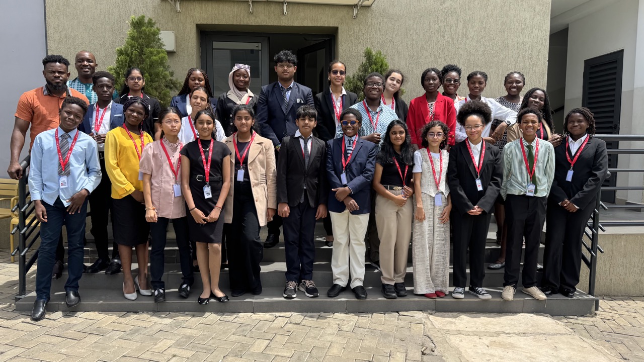 ARIS students and staff gathered after an in-house Model United Nations simulation